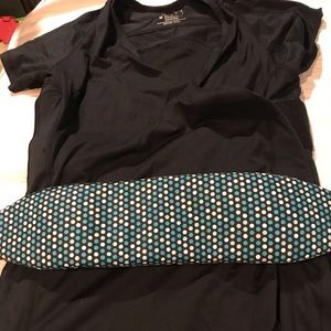 Nuroo Pocket baby wearing short sleeved shirt